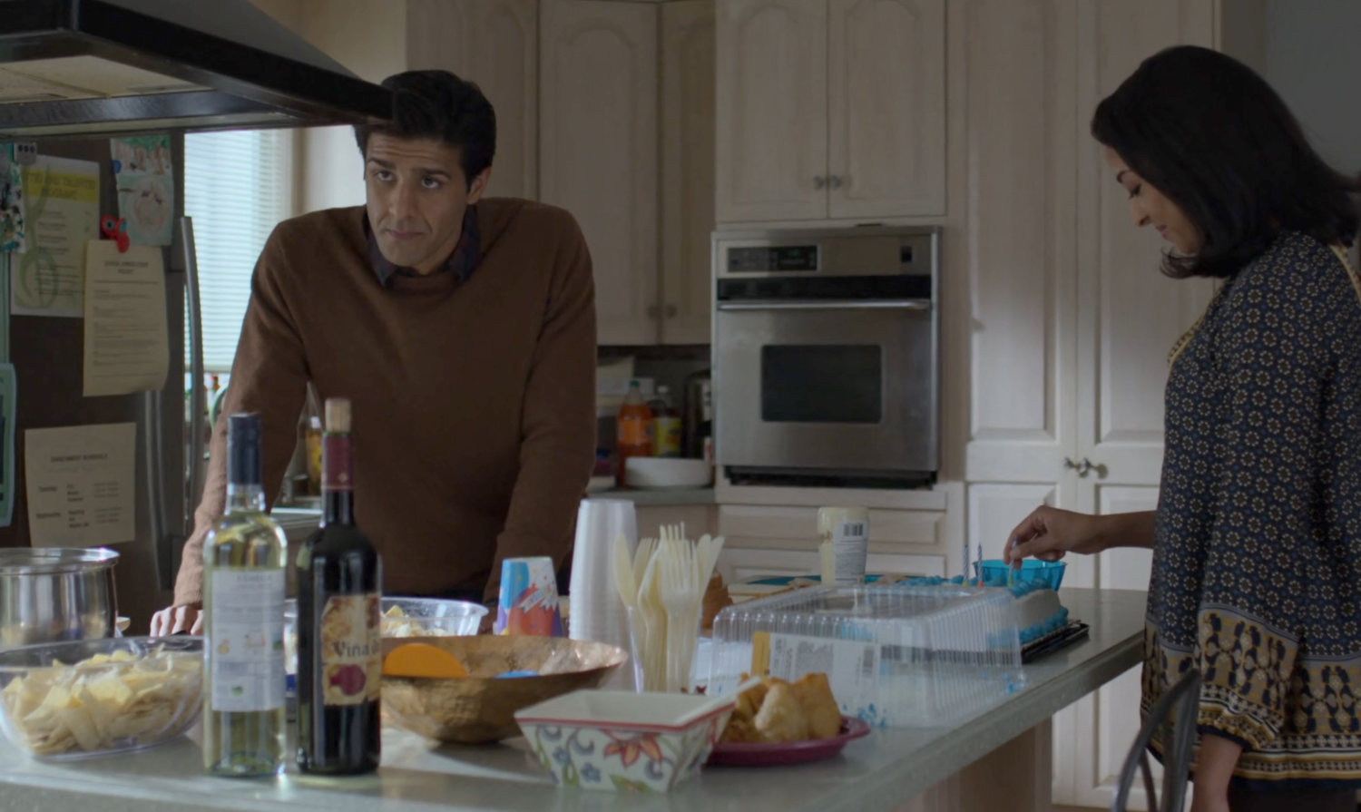 Ray and Seema Nadeem in their kitchen.