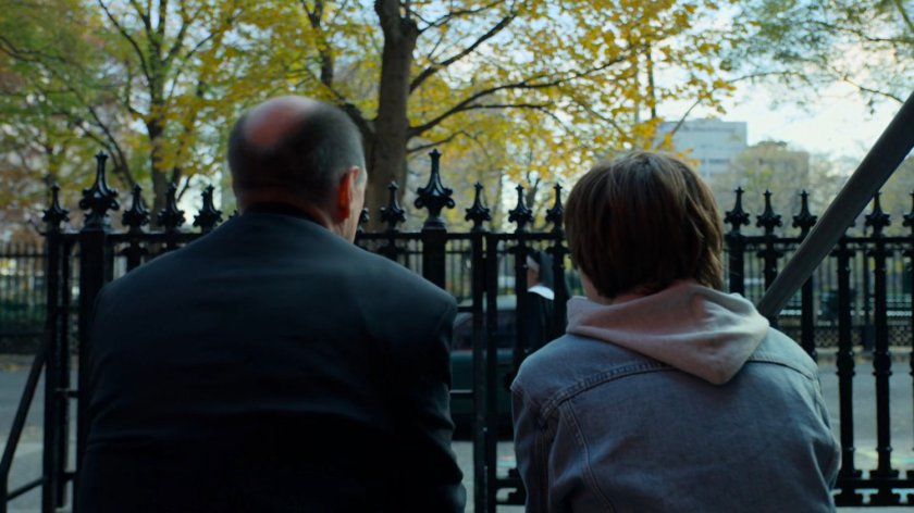 Young Matt speaks with Father Lantom outside the church.