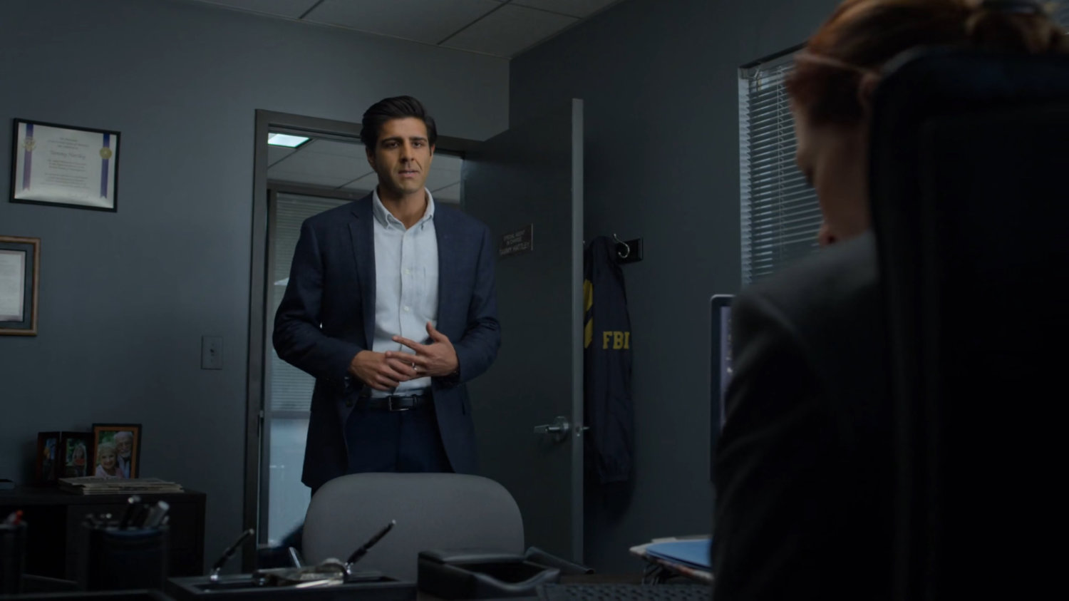 Ray talking to Director Hattley in her FBI Office.