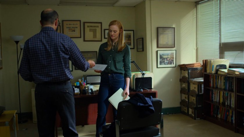 Karen talking to Ellison in her office at the New York Bulletin.