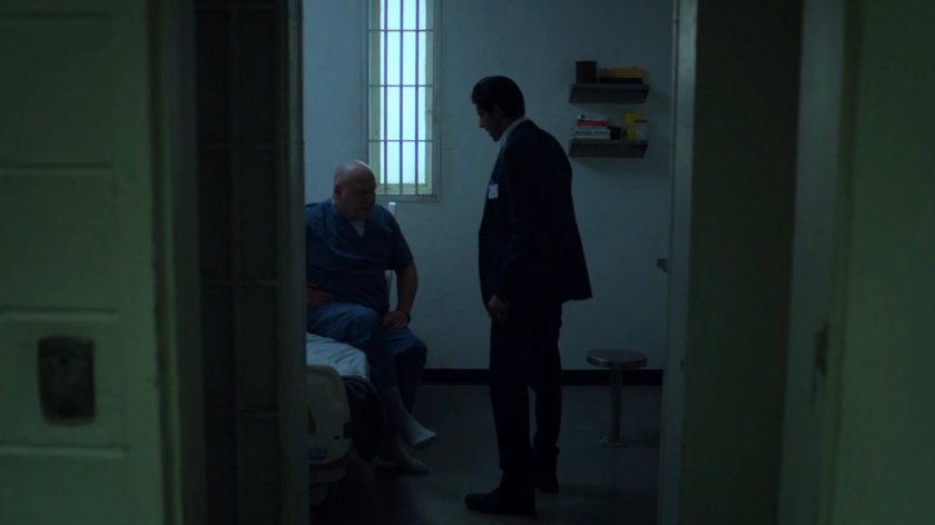 Nadeem talking to Fisk in his penitentiary cell.