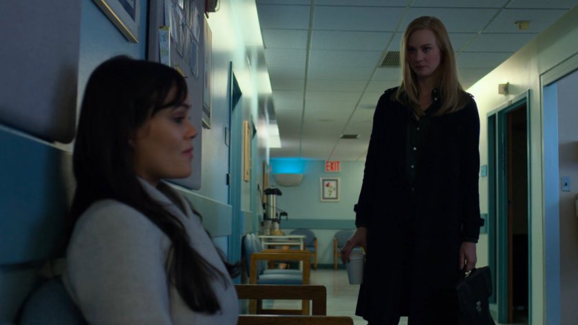 Karen talks to Neda Kazemi in Riverbank Hospital hallway.