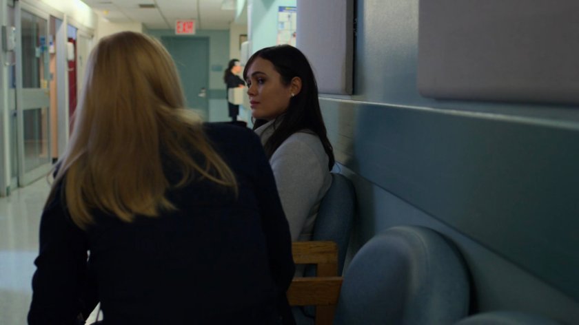 Karen talks to Neda Kazemi in Riverbank Hospital hallway.