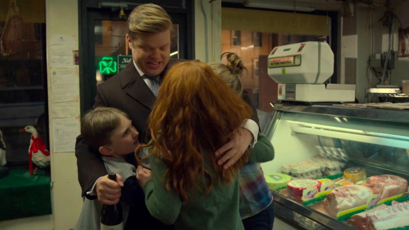 Foggy greets his nieces and nephews in Nelson Meats butcher store.