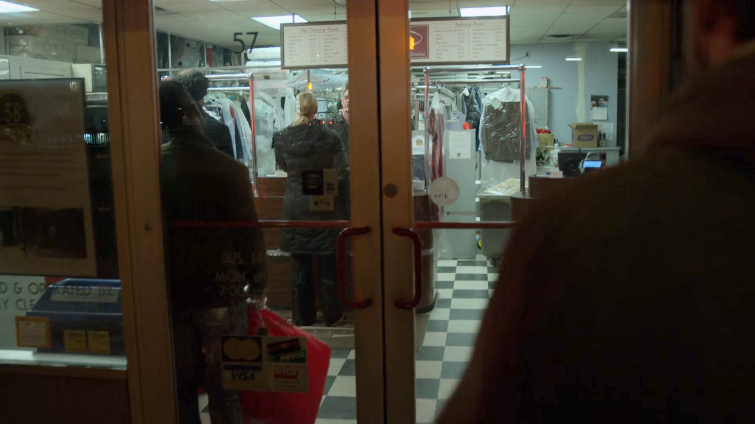 Matt entering Chris French dry cleaners.