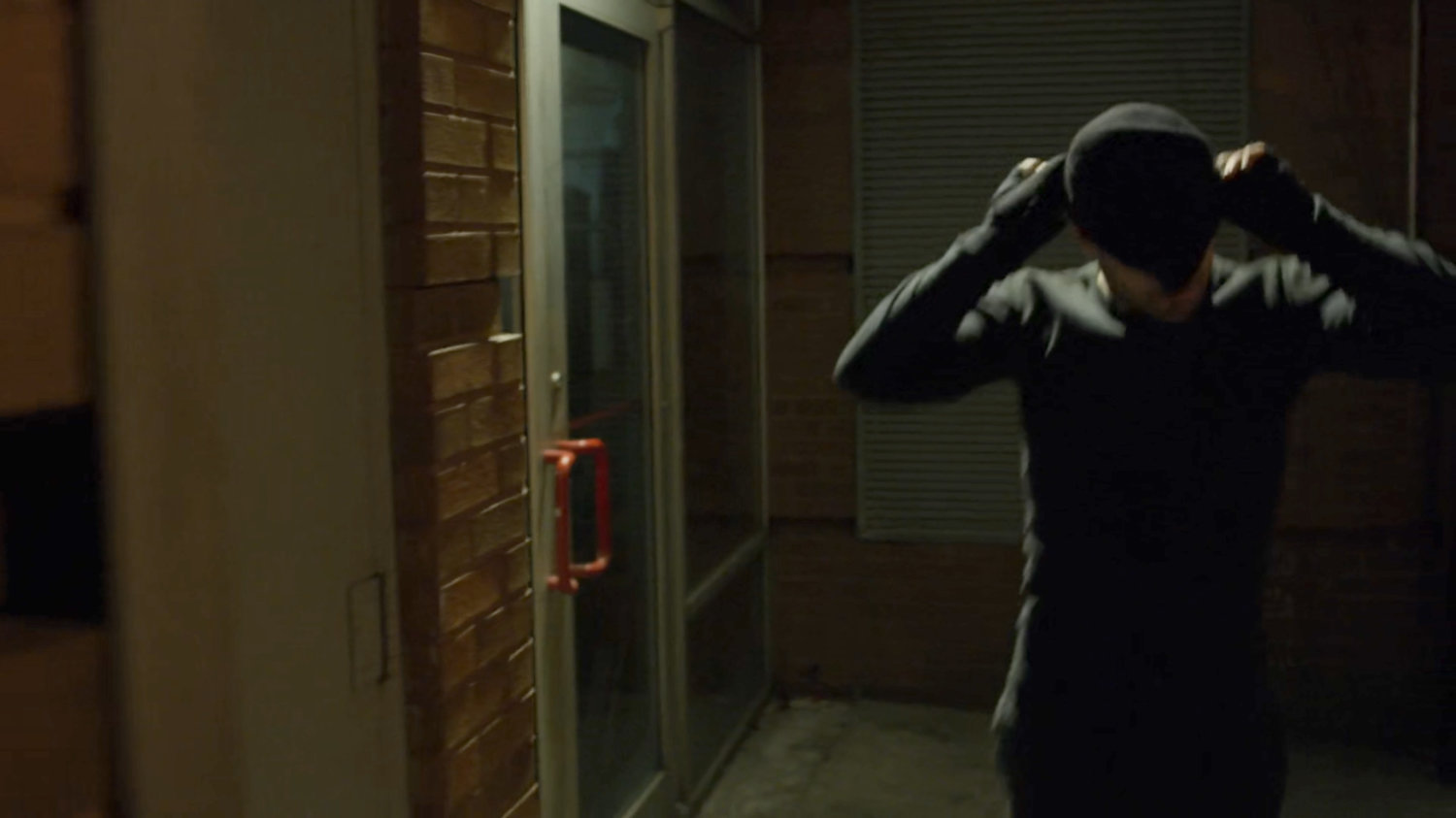 Matt dons his mask outside Chris French dry cleaners.
