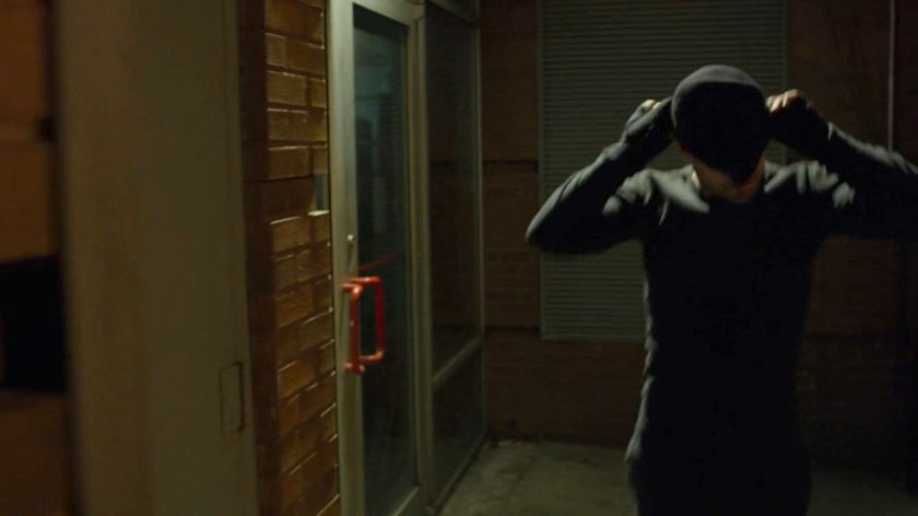 Matt dons his mask outside Chris French dry cleaners.