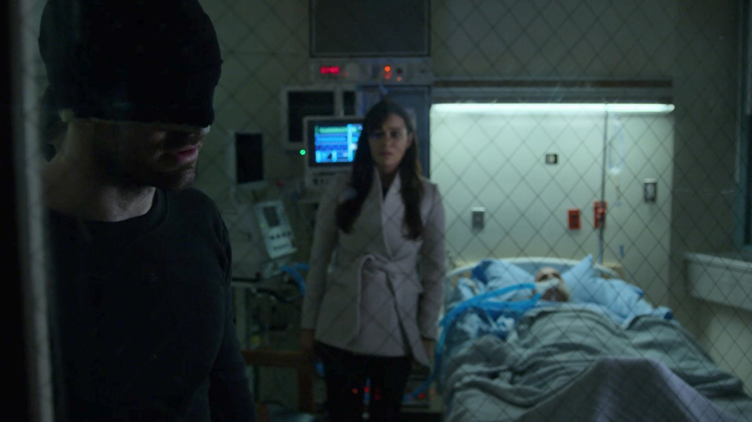 The Man in Black in the Kazemi hospital room.