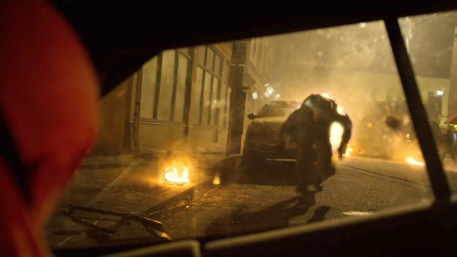 View of FBI agent outside SUV window in the aftermath of a car bombing.