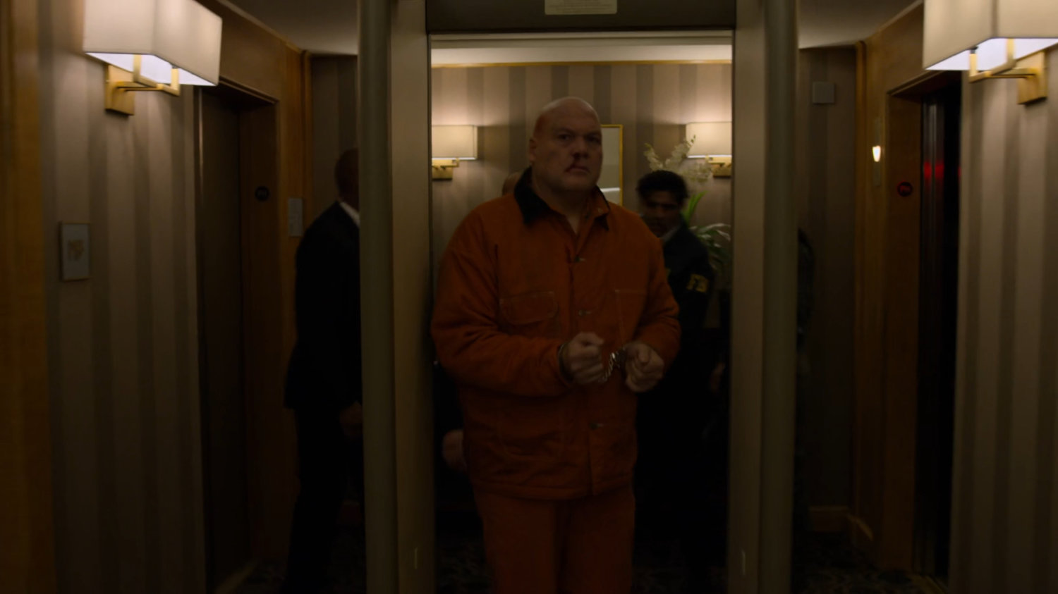 Fisk with Nadeem and Dex in the hallway of the Presidential Hotel.
