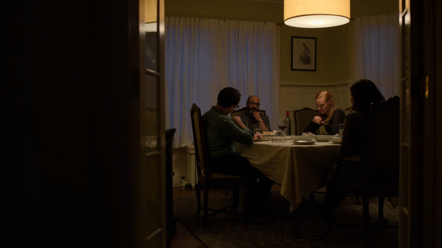 Karen joins Mitchell and Lily Ellison and their nephew Jason for dinner at the Ellison house.
