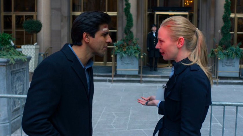 Karen speaking to Nadeem in front of the Presidential Hotel.