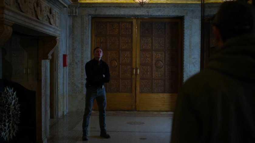 Matt walking towards Dex at the Presidential Hotel elevators.