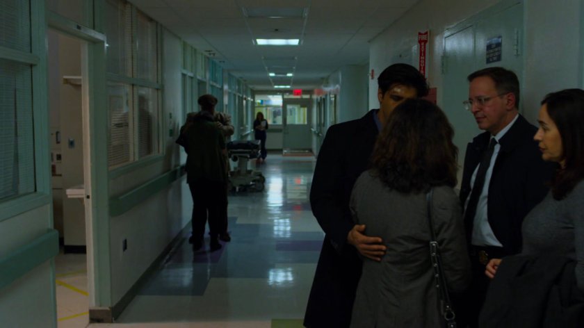 Nadeem and some family's in the hallway of the hospital.