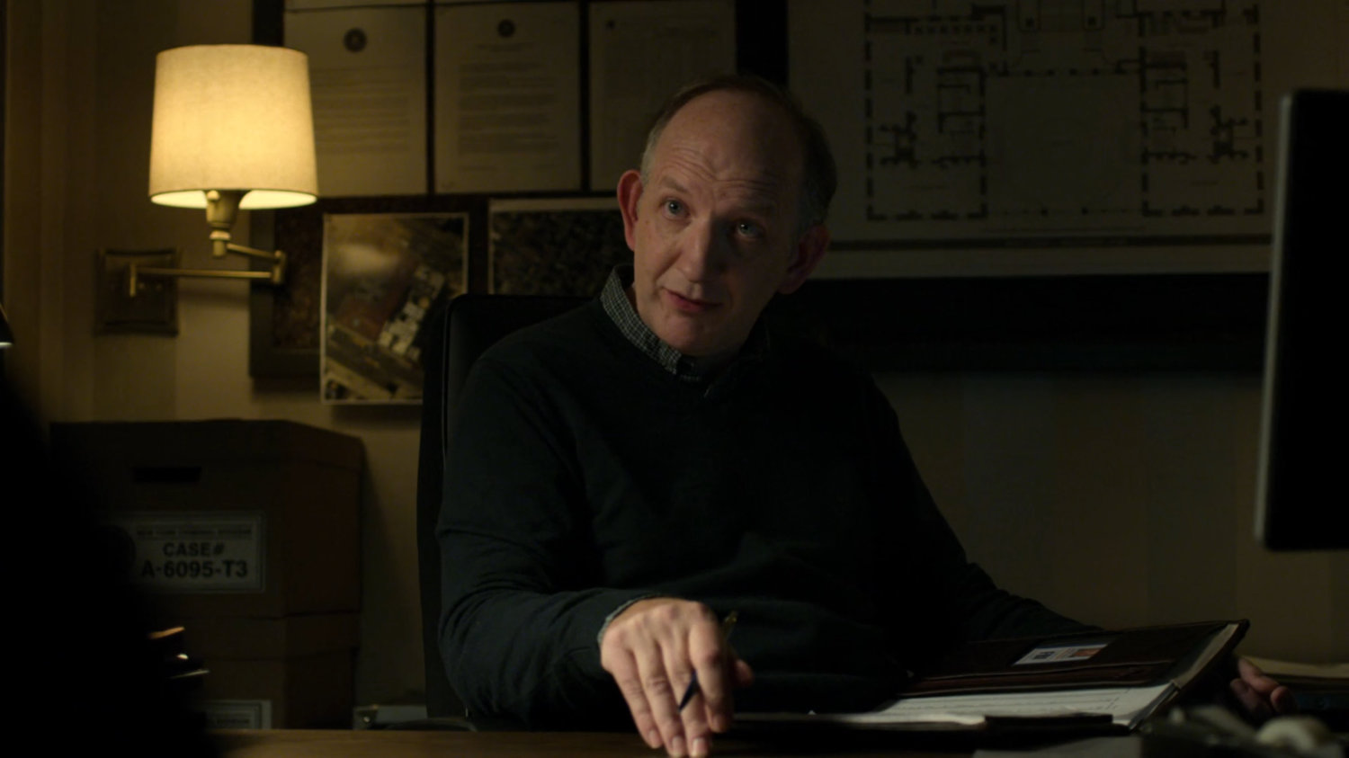 Dex's doctor speaking with him.