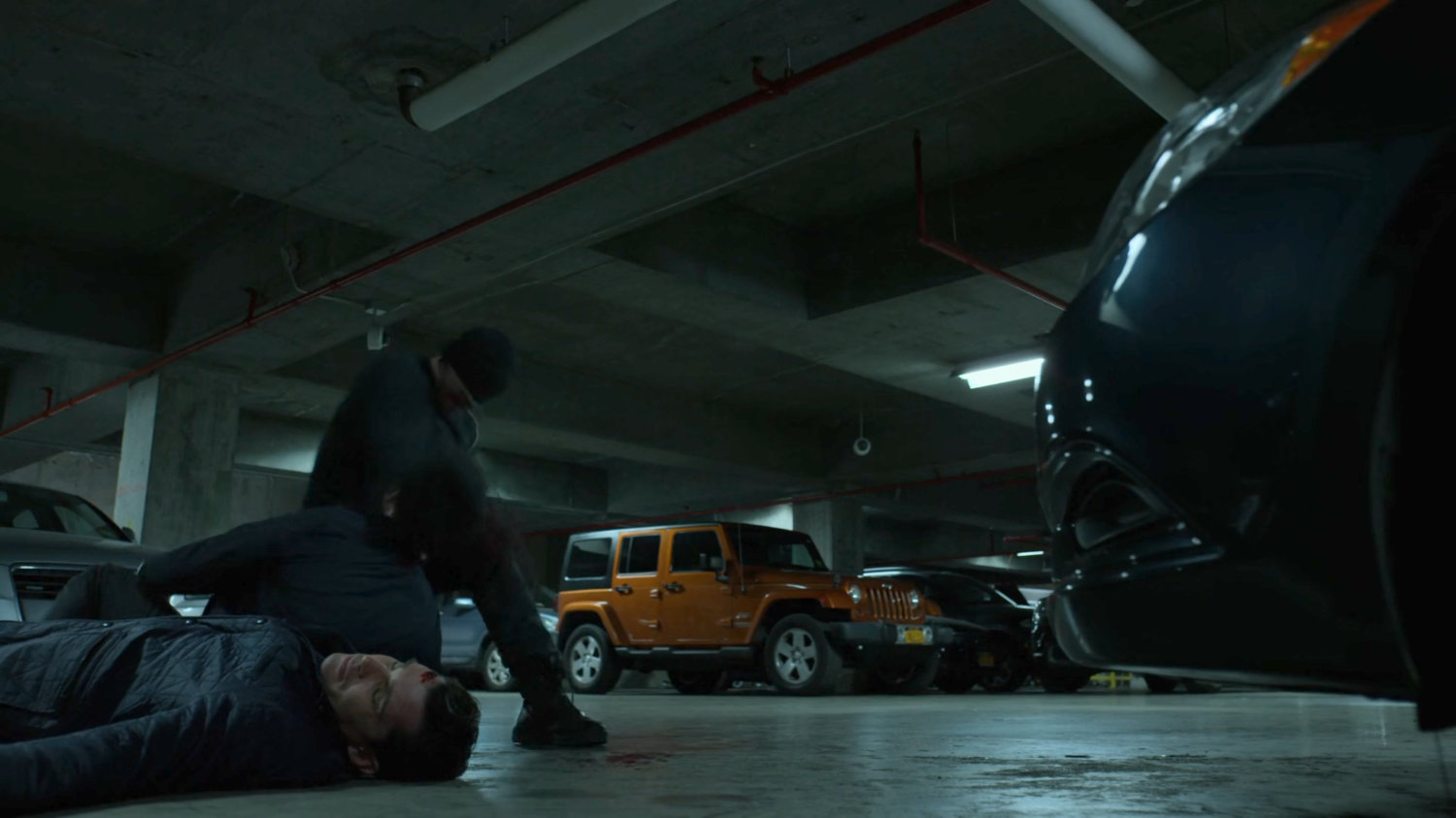 The Man in Black assaults FBI agents in the Hotel parking garage.