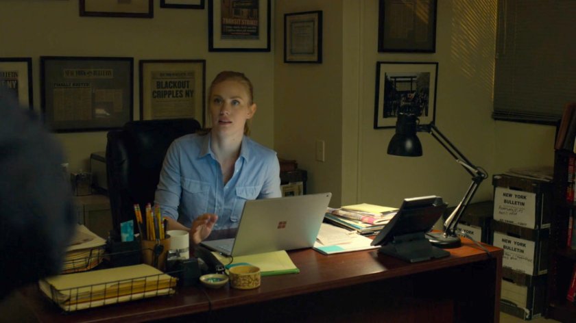 Karen in her office at the New York Bulletin.