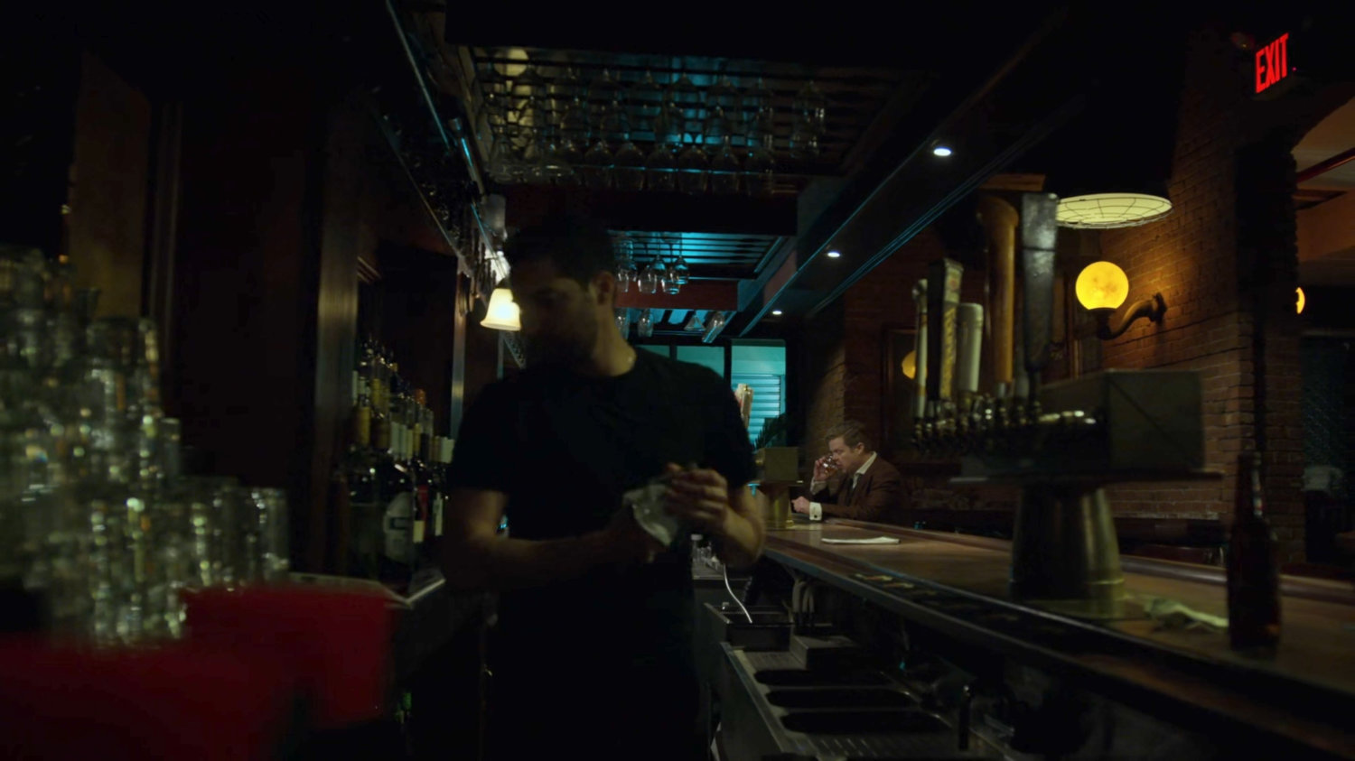 Foggy drinking alone in a bar.