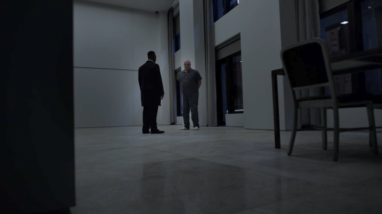 Fisk and his lawyer, Donovan, in the penthouse of the Presidential Hotel.