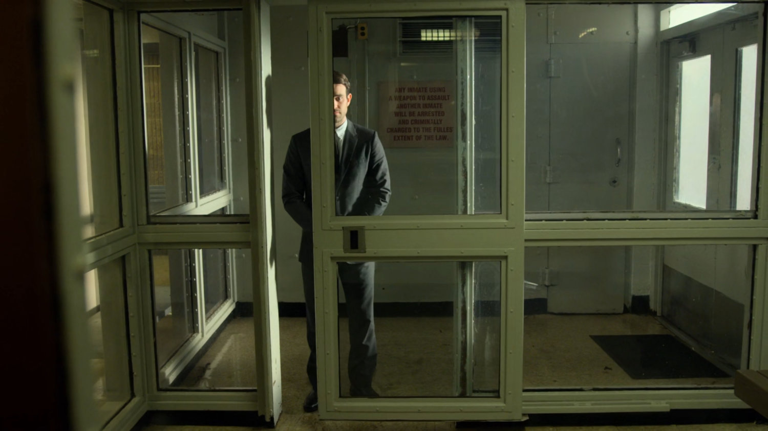Matt inside penitentiary security gate.