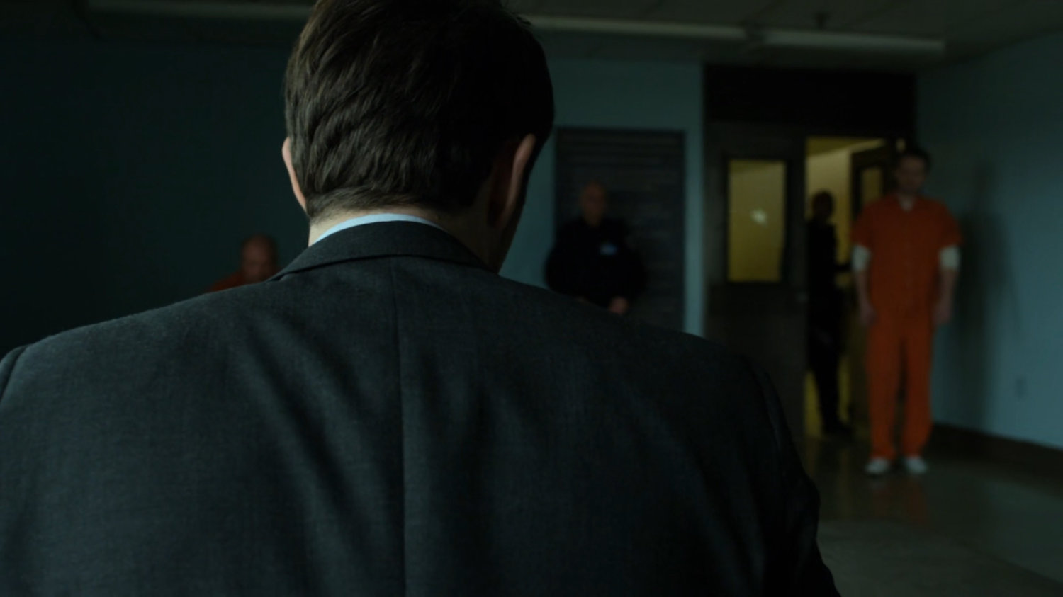Michael walks in to speak with Matt in the penitentiary visitor room.
