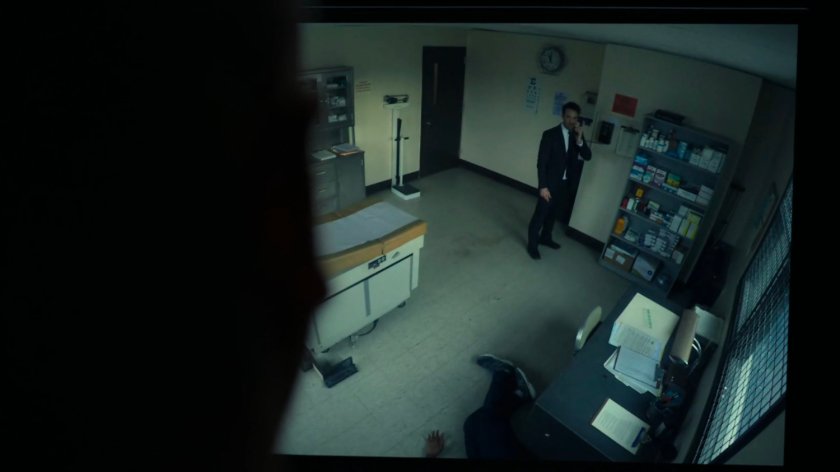 Video feed of Matt in the medical room of the penitentiary.