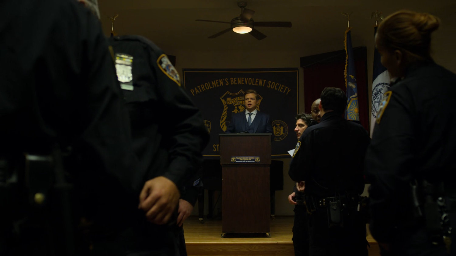 Foggy speaks to the officers at the police union meeting.