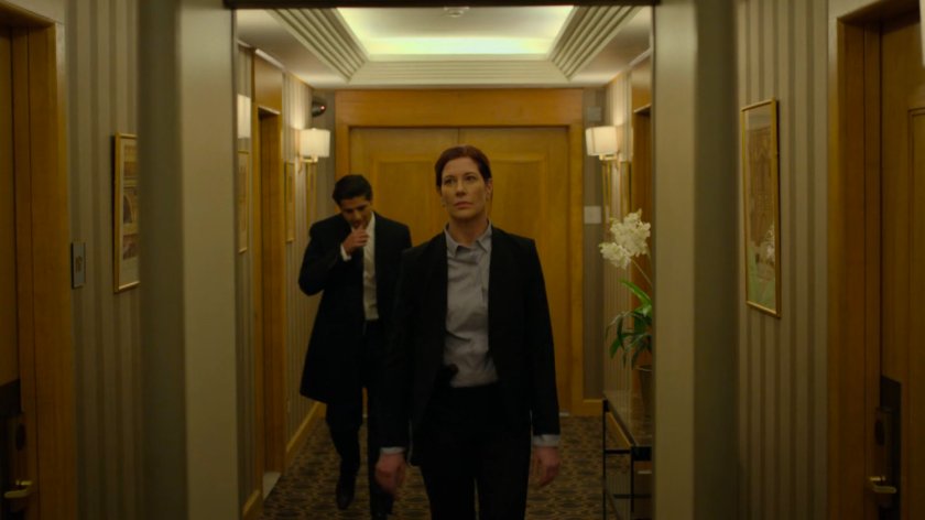 Nadeem and Hattley in the hallway of the Presidential Hotel.