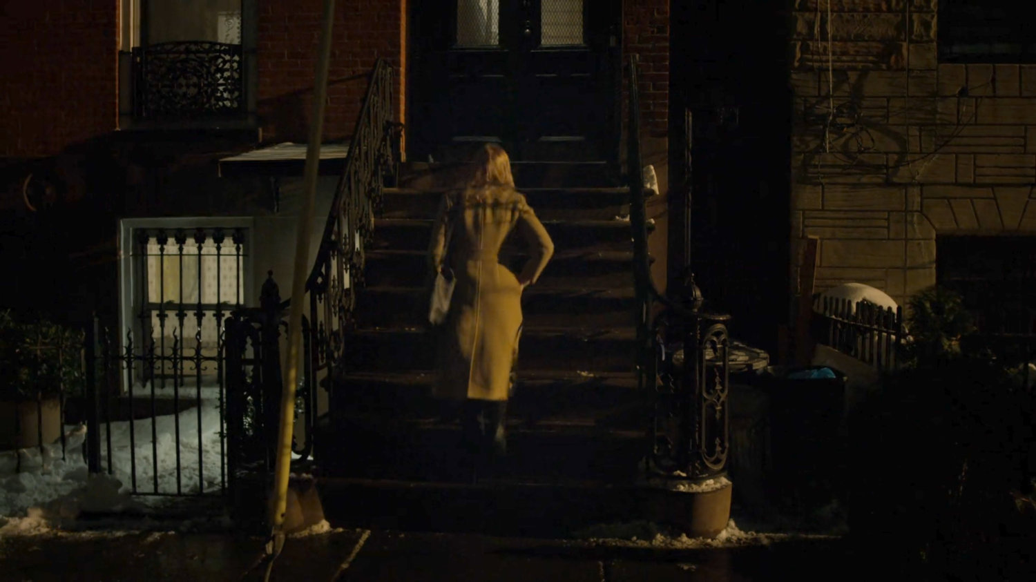 Karen outside Tanya Mills building at night.