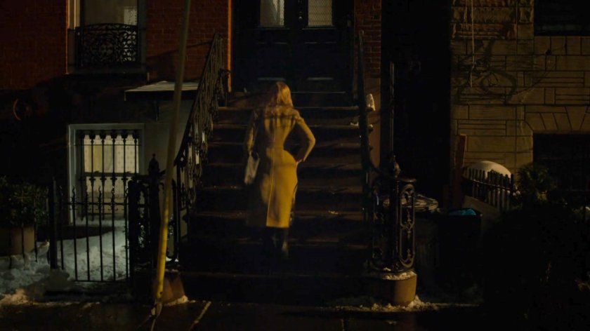 Karen outside Tanya Mills building at night.