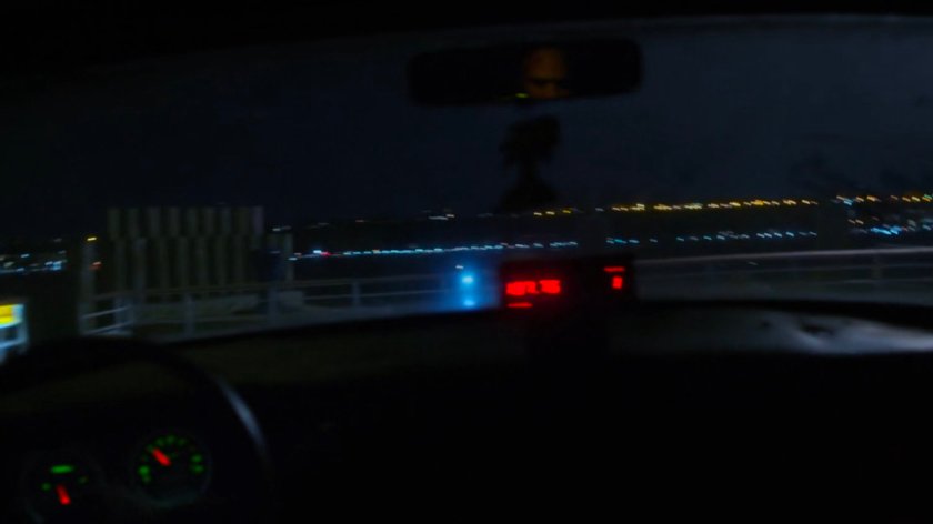 View of edge of pier at night.