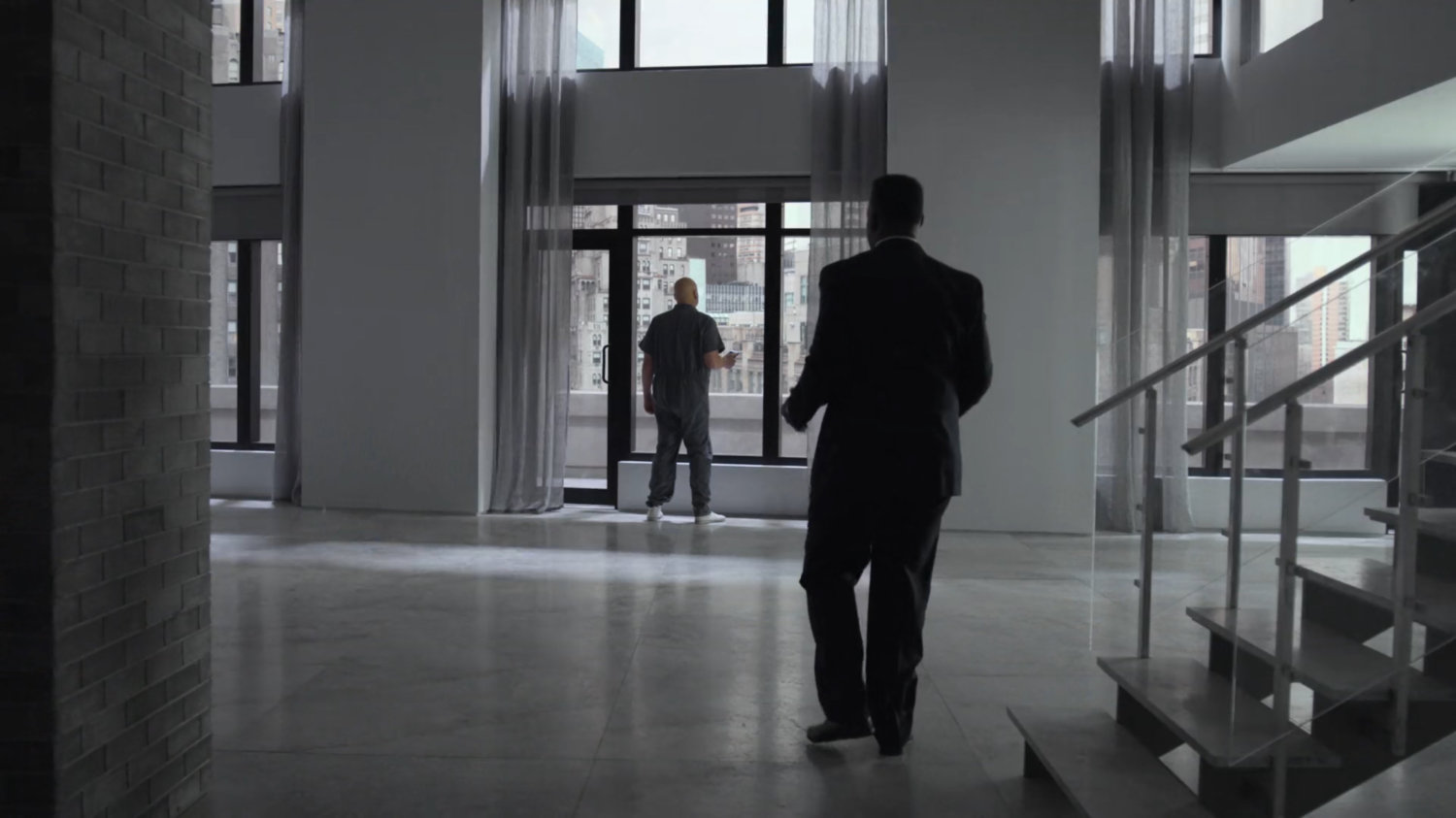 Fisk's lawyer, Donovan, speak to Fisk in the penthouse of the Presidential Hotel.
