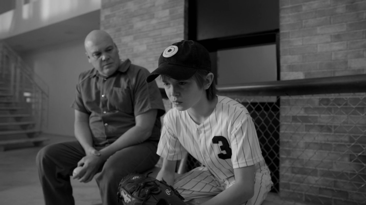 Flashback of young Dex on the bench at a little league game while Fisk looks on, set in the penthouse of the Presidential Hotel.