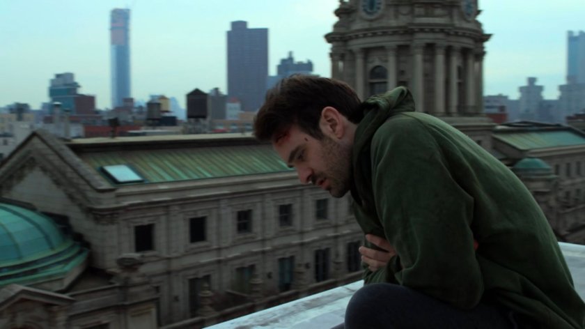 Matt perched on the rooftop of his apartment.