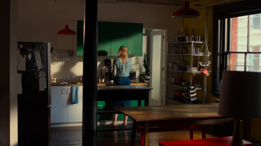 Karen in the kitchen of her apartment.