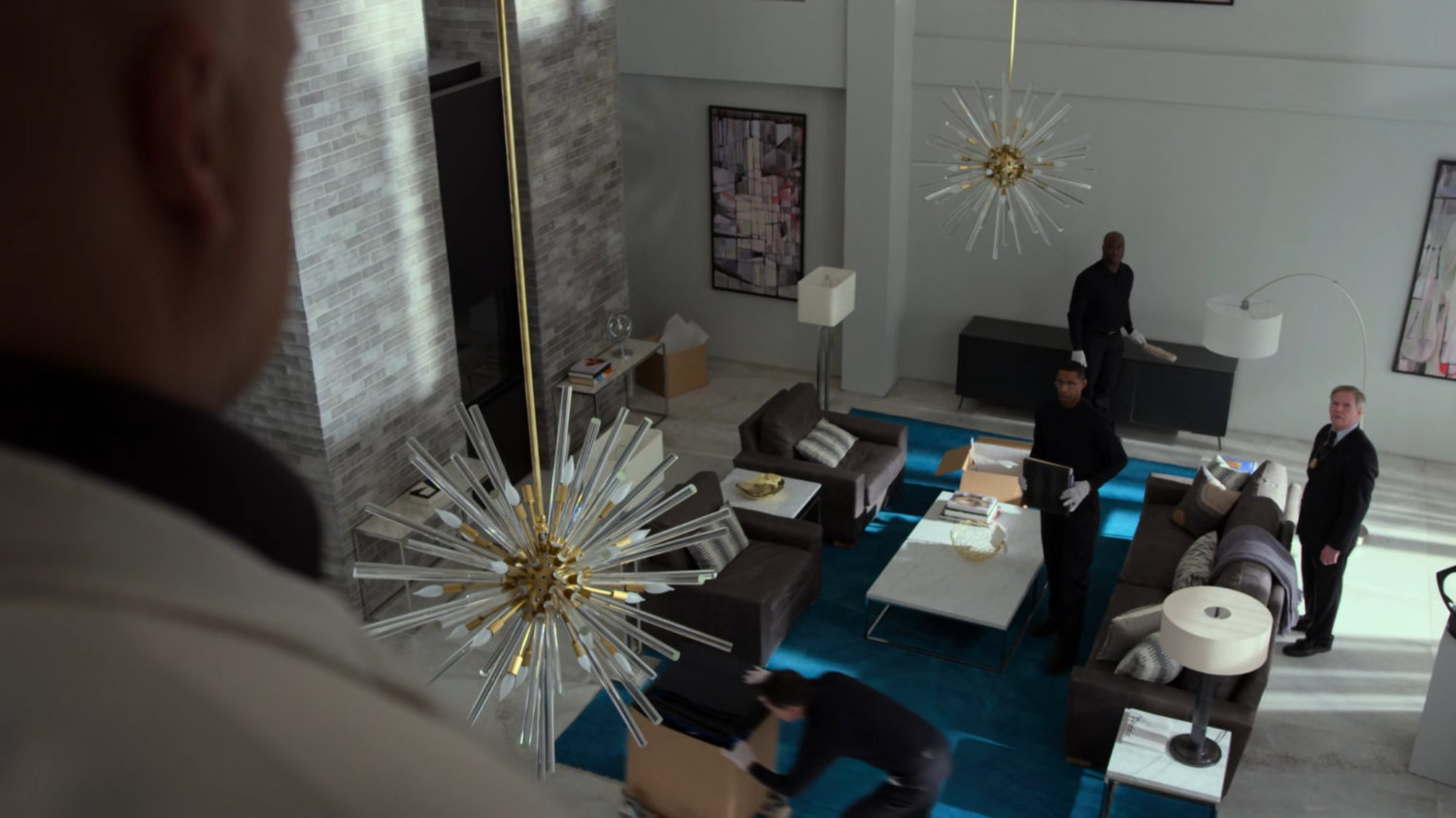 Fisk looking down on living room of penthouse in Presidential Hotel.