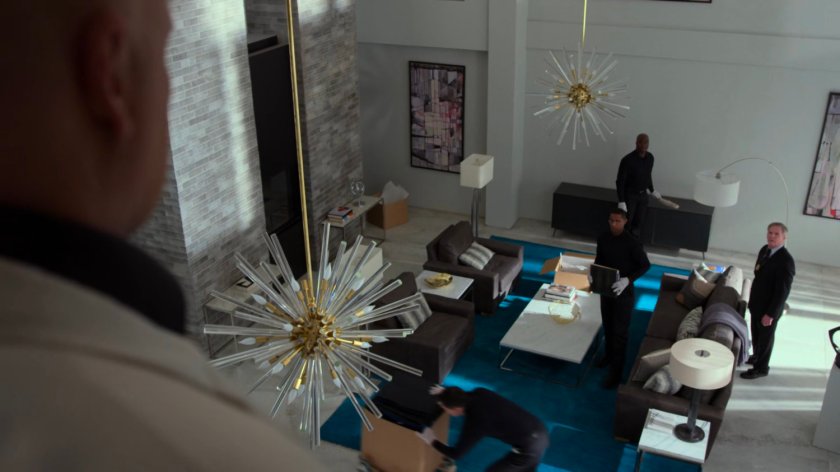 Fisk looking down on living room of penthouse in Presidential Hotel.