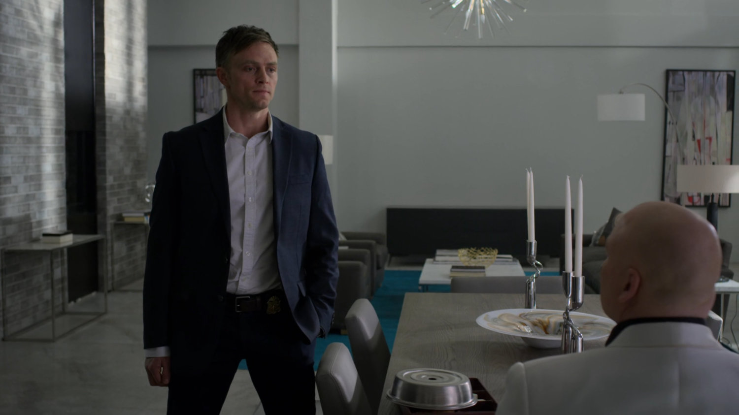 Dex and Fisk in penthouse in Presidential Hotel.