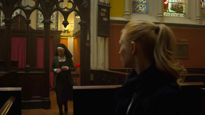 Karen speaking to Sister Maggie in Matt's church.