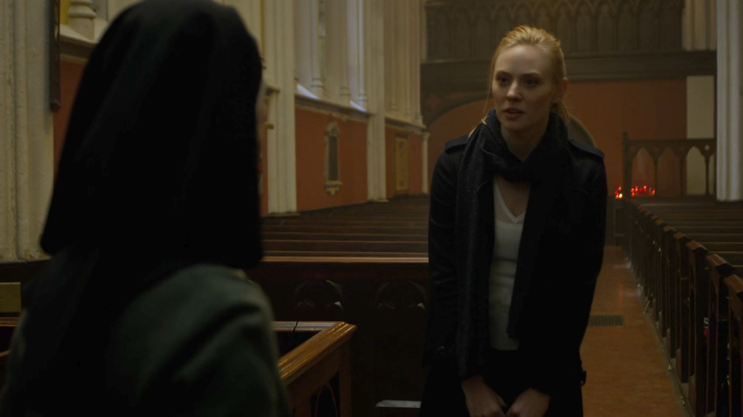 Karen speaking to Sister Maggie in Matt's church.