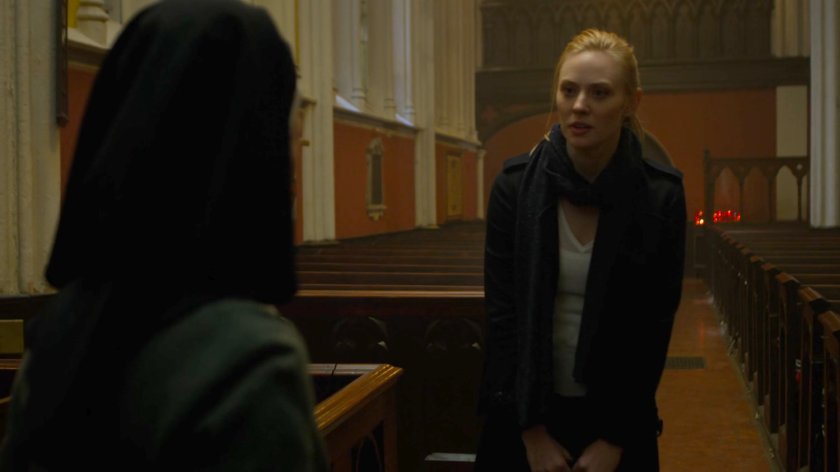 Karen speaking to Sister Maggie in Matt's church.