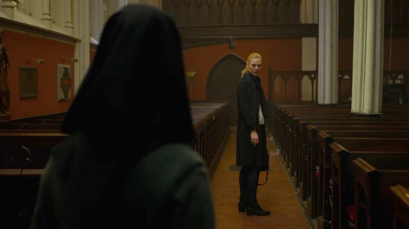 Karen speaking to Sister Maggie in Matt's church.