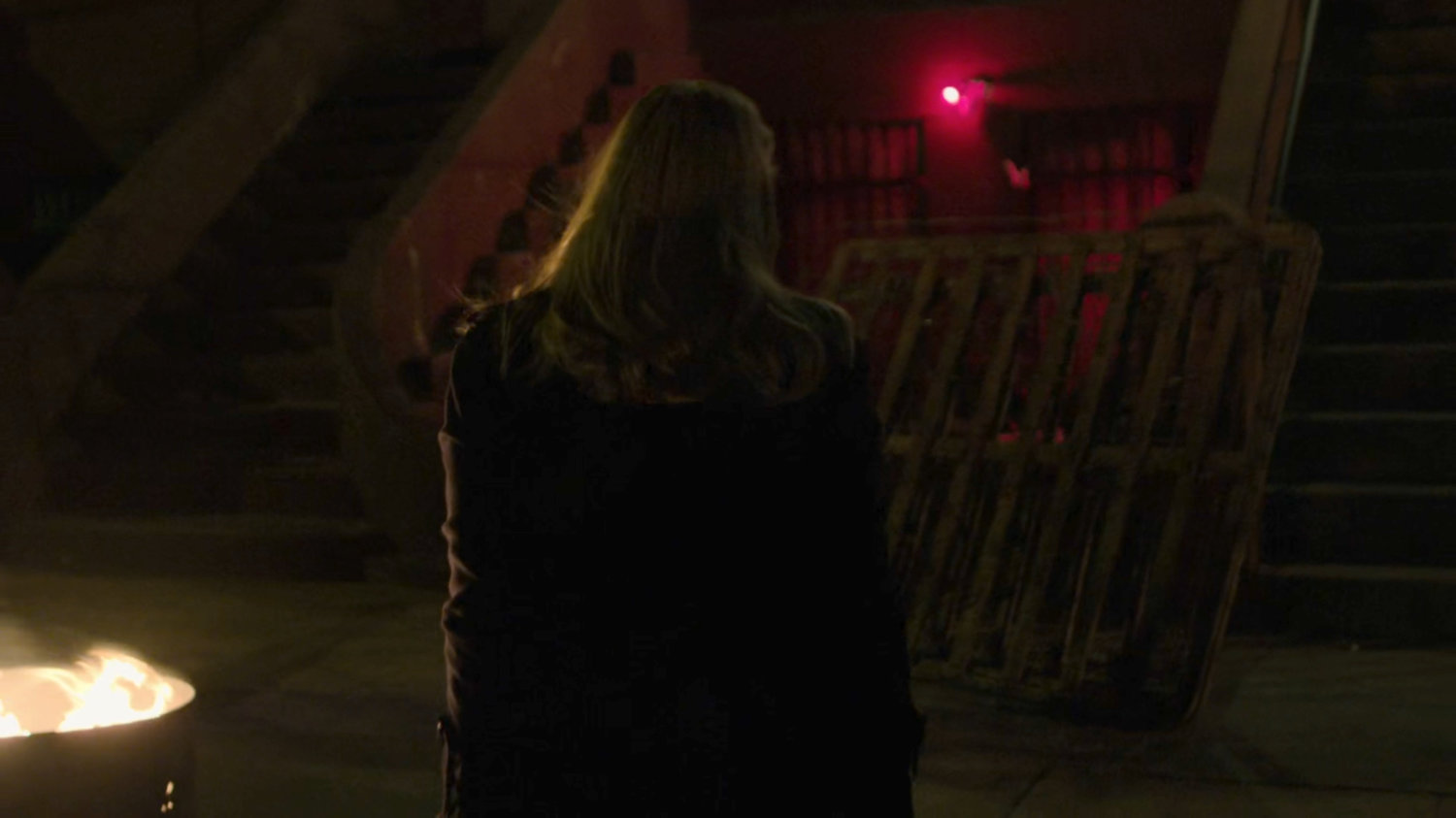 Karen walking towards Jasper Evans rowhome.