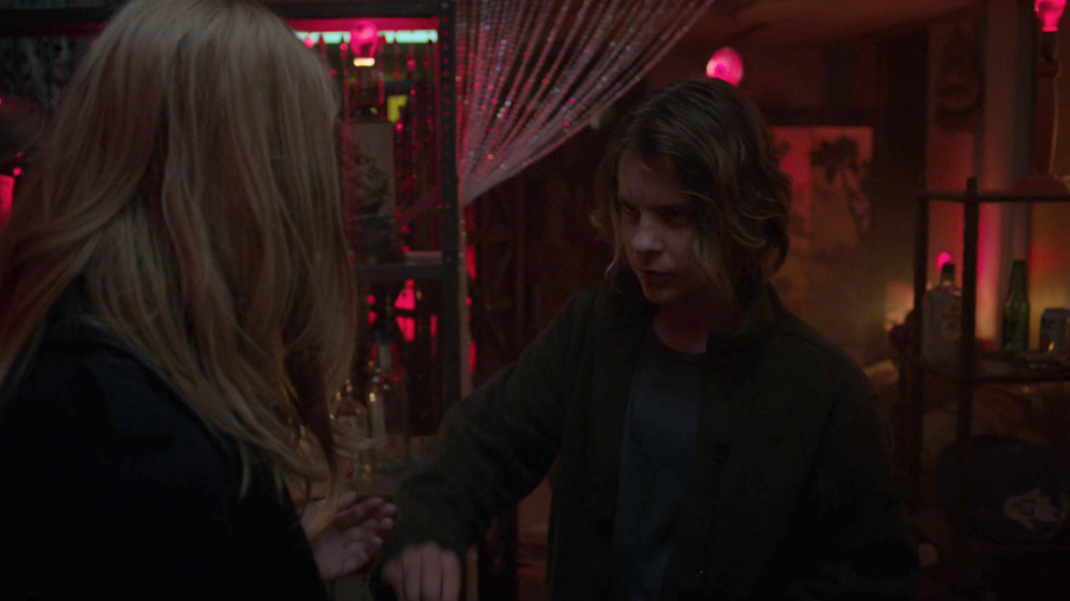 Karen buying drugs inside Jasper Evans rowhome.