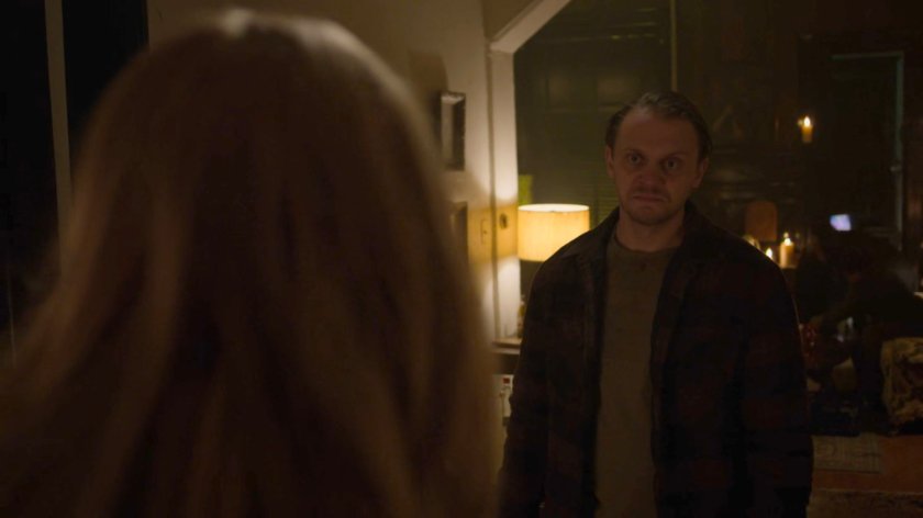 Karen talking to Jasper Evans inside his rowhome.