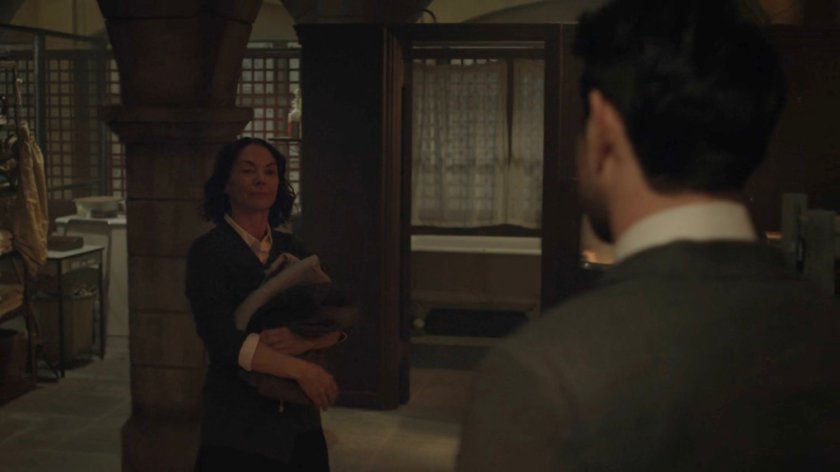 Matt talking with Maggie in the basement of the church.