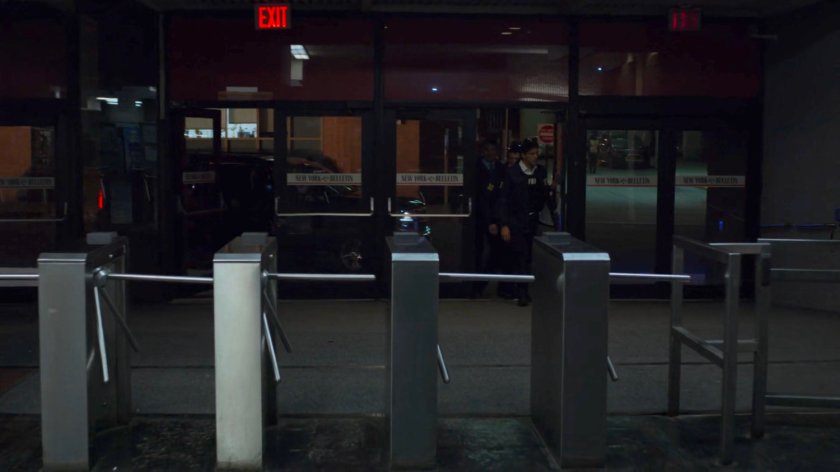 The FBI enter the New York Bulletin lobby.