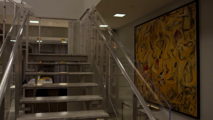 View of stairs and artwork in the penthouse of the Presidential Hotel.