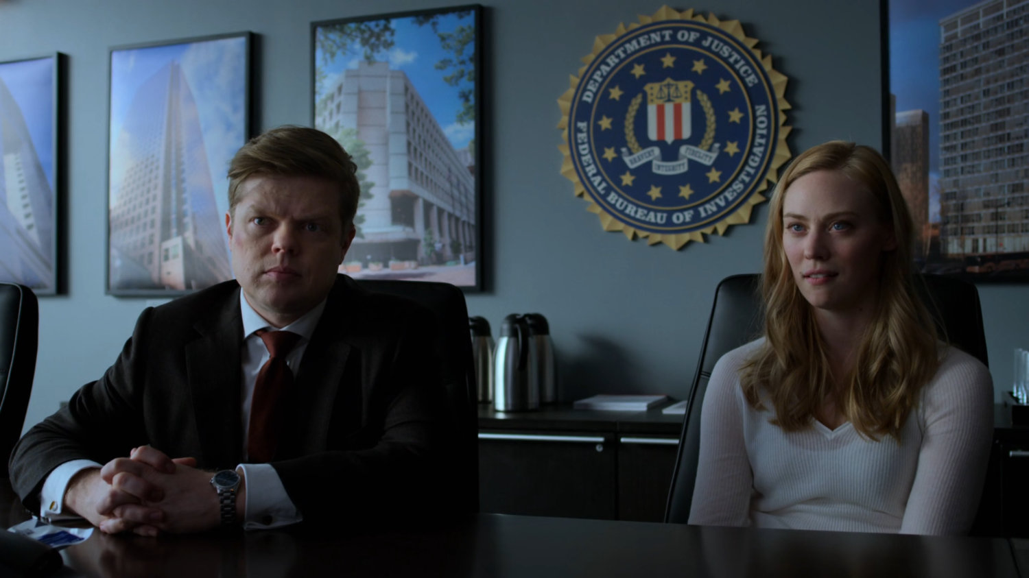 Karen and Foggy in the FBI Offices meeting room.