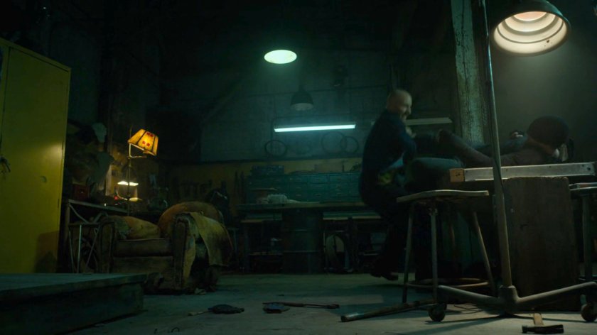 Matt and Melvin fighting in Melvin's new workshop.